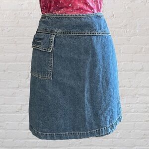 New York & Company medium wash denim wrap skirt secured with Velcro